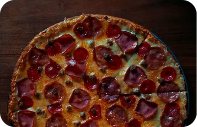 Pepperoni pizza with melted cheese on a wooden background